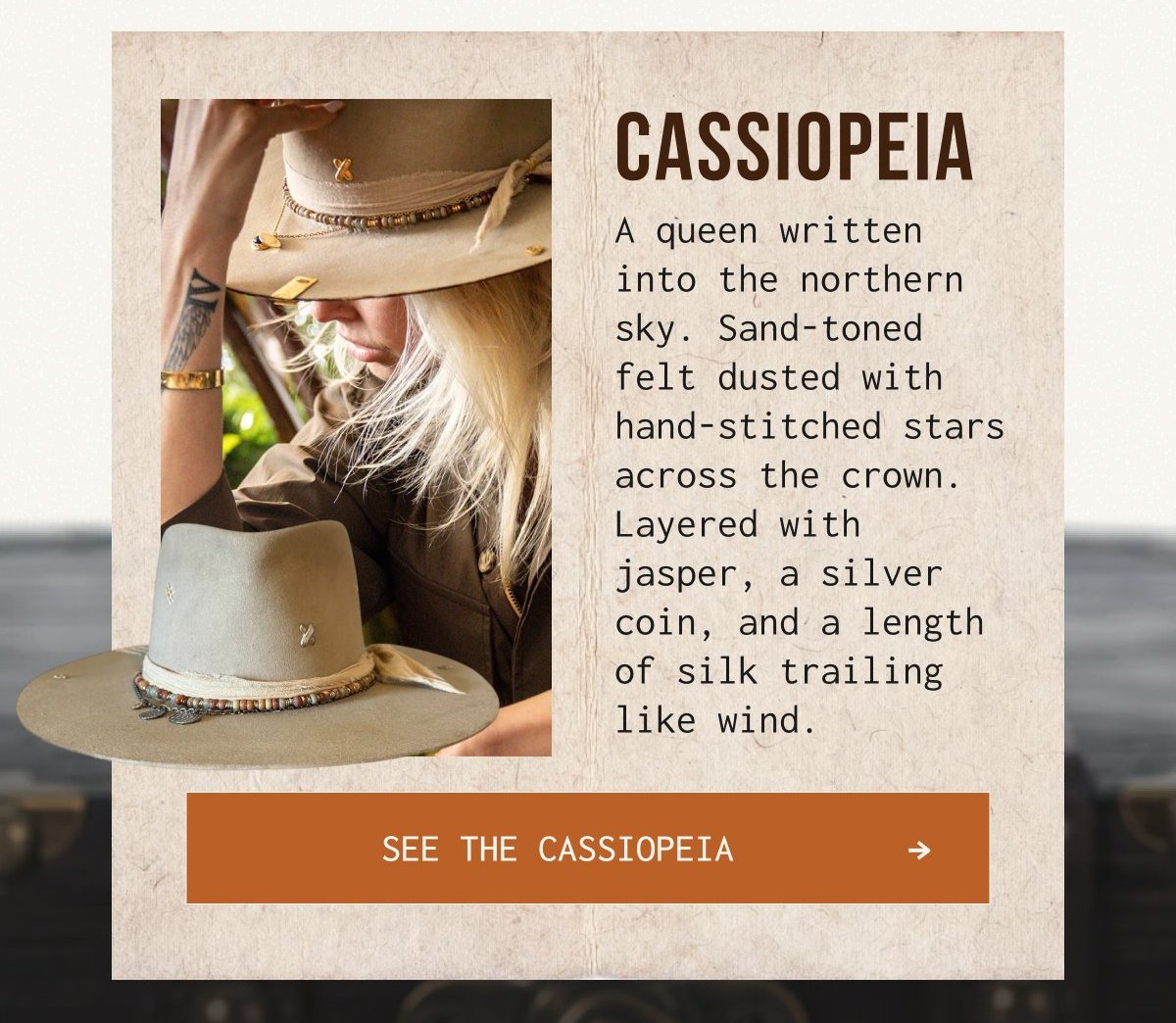 CASSIOPEIA - A queen written into the northern sky. Sand-toned felt dusted with hand-stitched stars across the crown. Layered with jasper, a silver coin, and a length of silk trailing like wind. | [SEE THE CASSIOPEIA →]