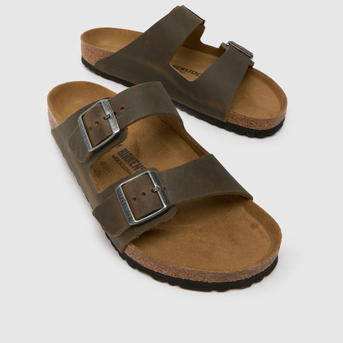 An image of a pair of brown BIRKENSTOCK sandals