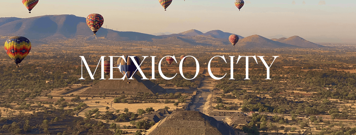 Many hot-air balloons floating above stepped pyramids; the image includes the text 'Mexico City'.