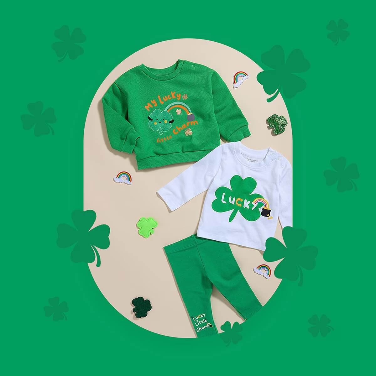 Children's clothing set for St Patrick's Day. White t-shirt, green sweatshirt and green pants