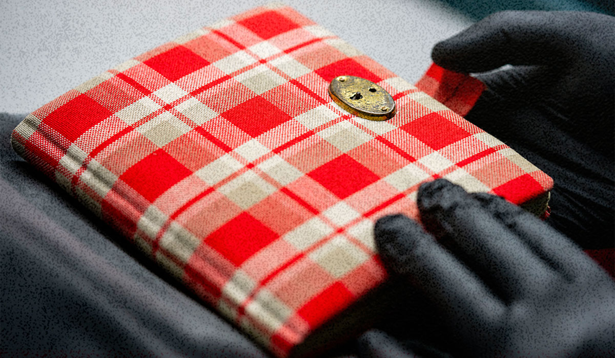 A red plaid journal.