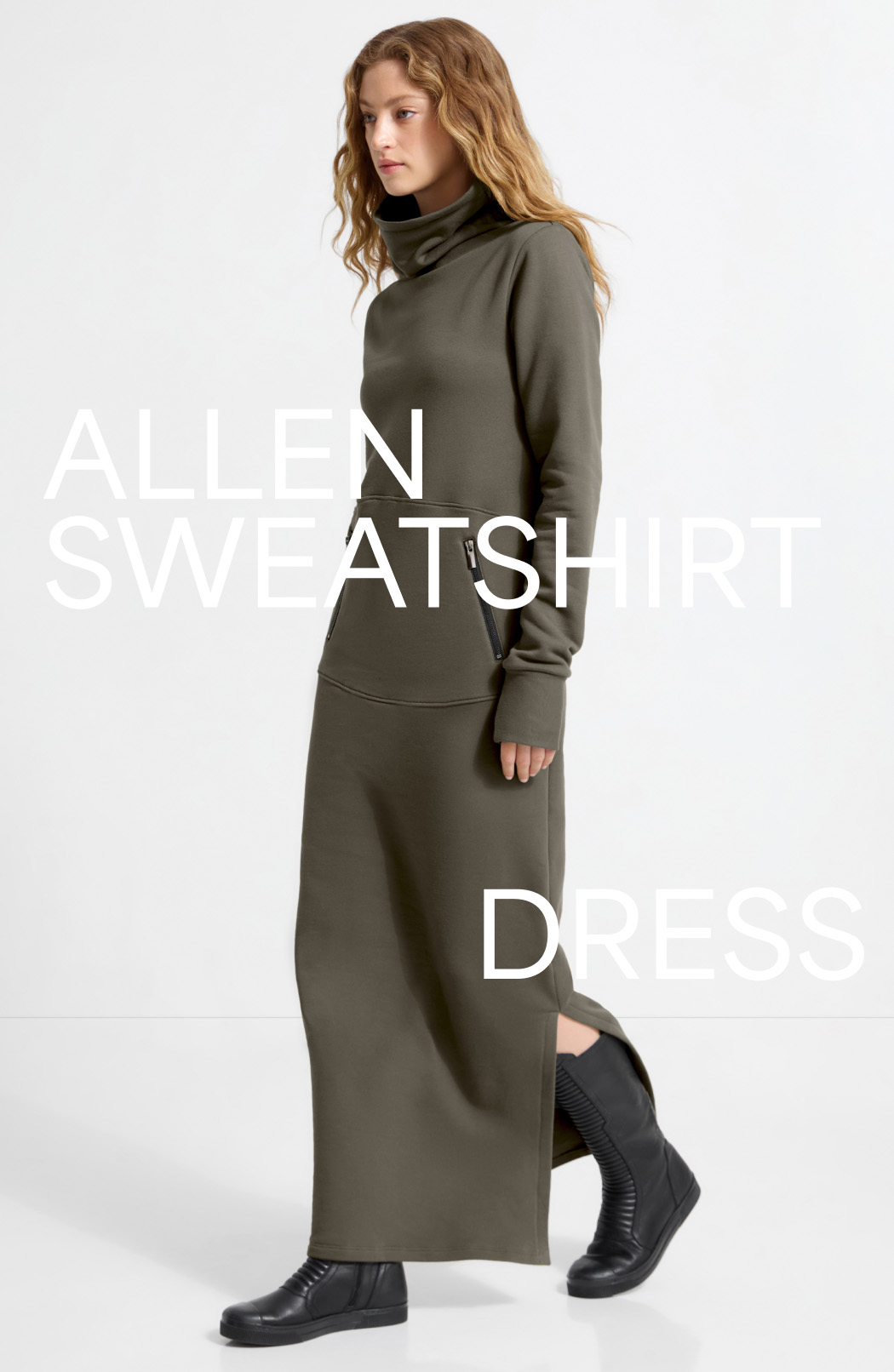 Sophie in The Allen Sweatshirt Dress with zipper pockets poses sideways.