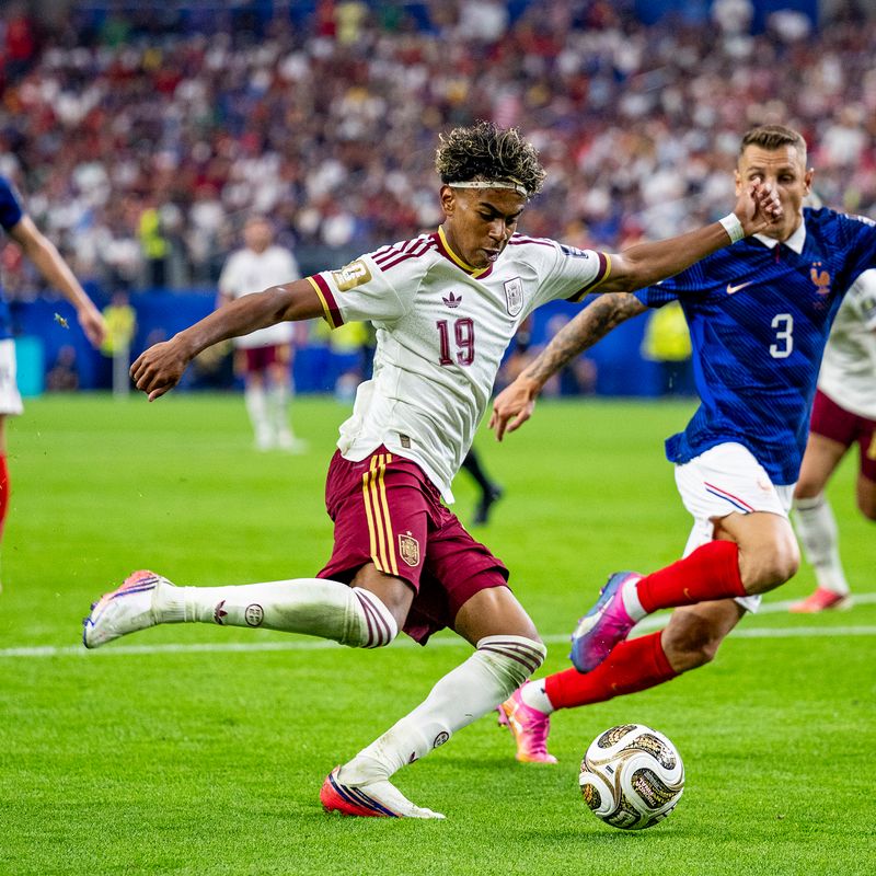 Figures play soccer