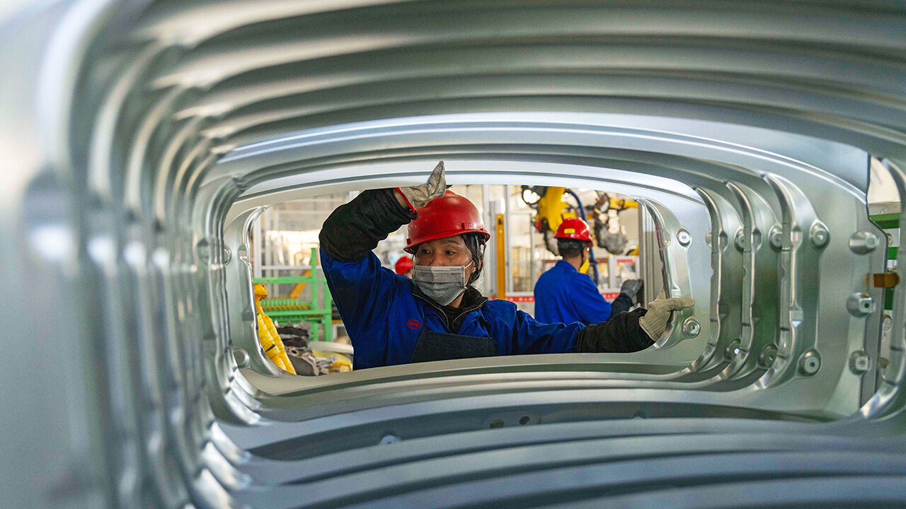 BYD employee works at an electric cars factory in China.