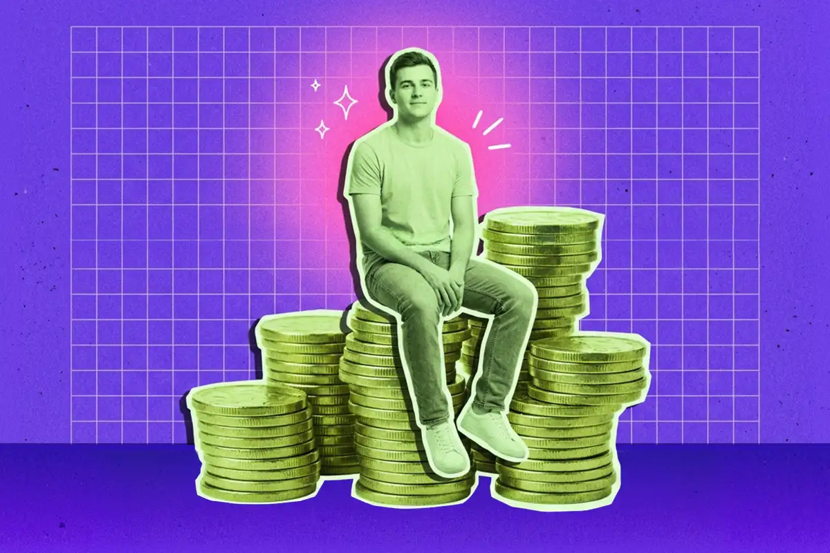 man sitting on piles of coins