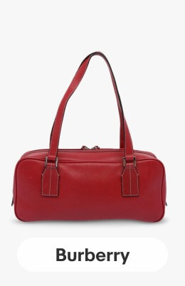 A red Burberry Leather Shoulder Bag.