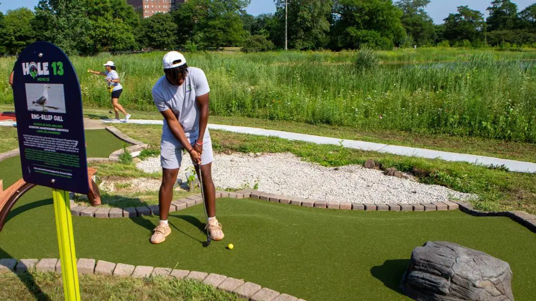Playing miniature golf at Douglass Park in Chicago.