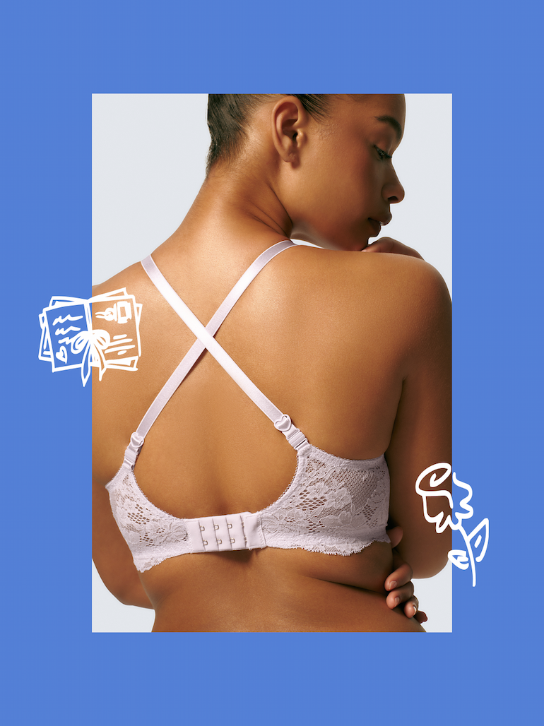 Image of a purple bra on a woman's back
