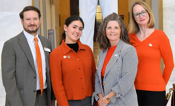 Kylin Brown standing with fellow MS activists in the U.S. Capitol building.