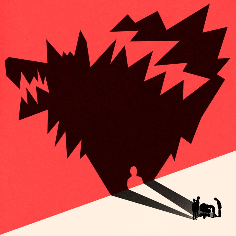 People casting a large shadow of a dog.