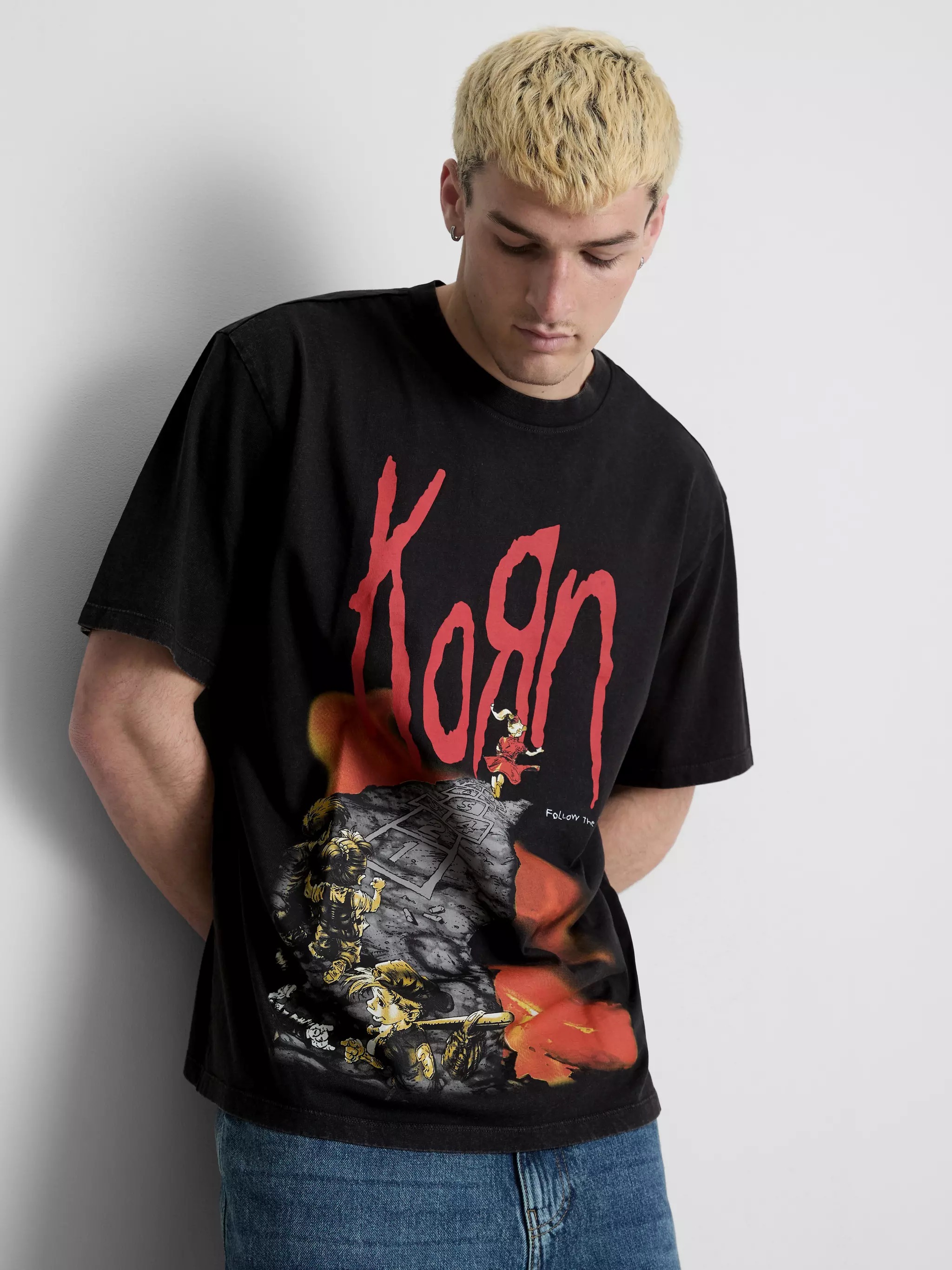 Man wearing a Korn Graphic T-Shirt