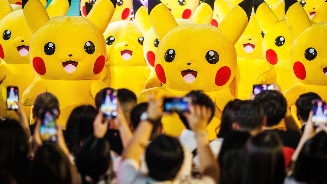 0 dancing Pikachu perform holiday songs at Central World Shopping Mall during a holiday kick off event in Bangkok, Thailand. 