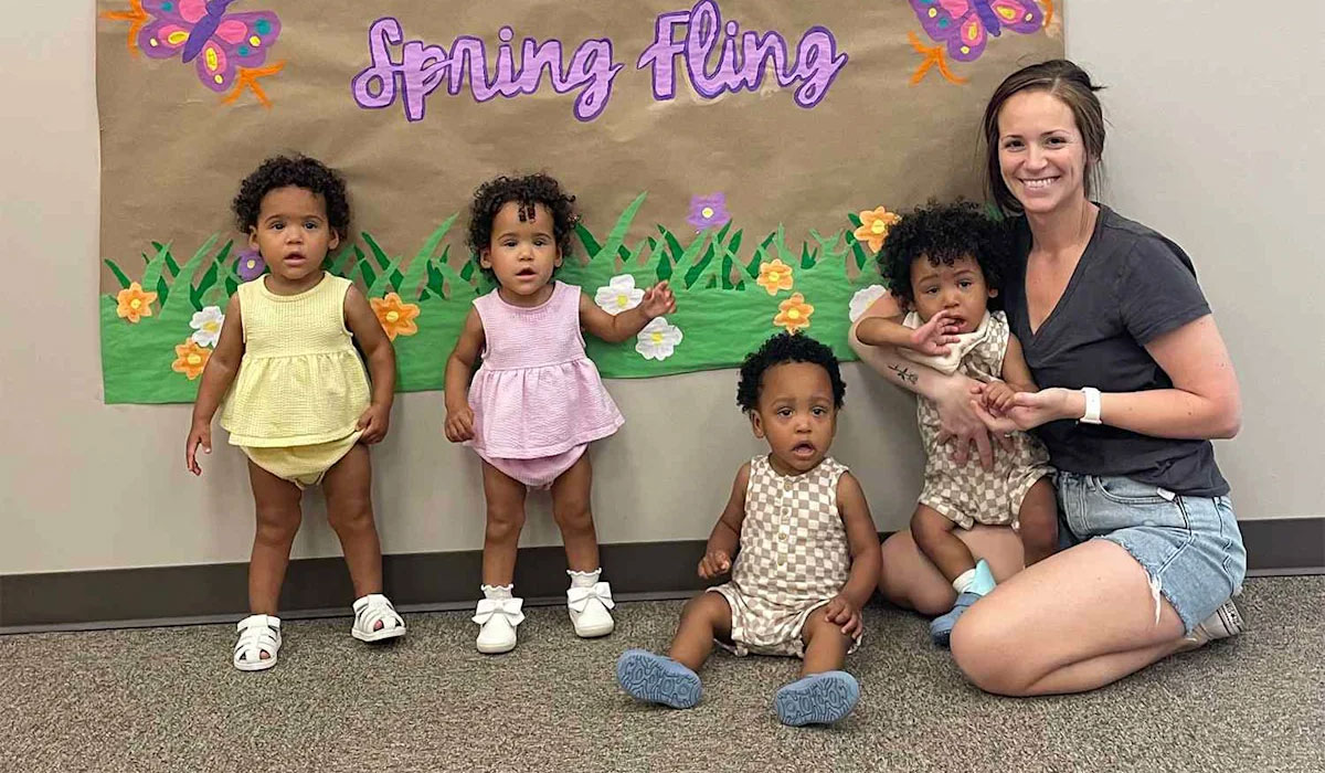 A mom with her four children.