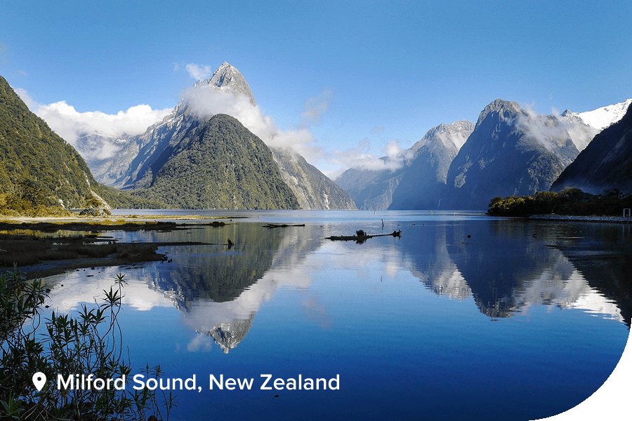 Lakeside mountains in Milford Sound, New Zealand.