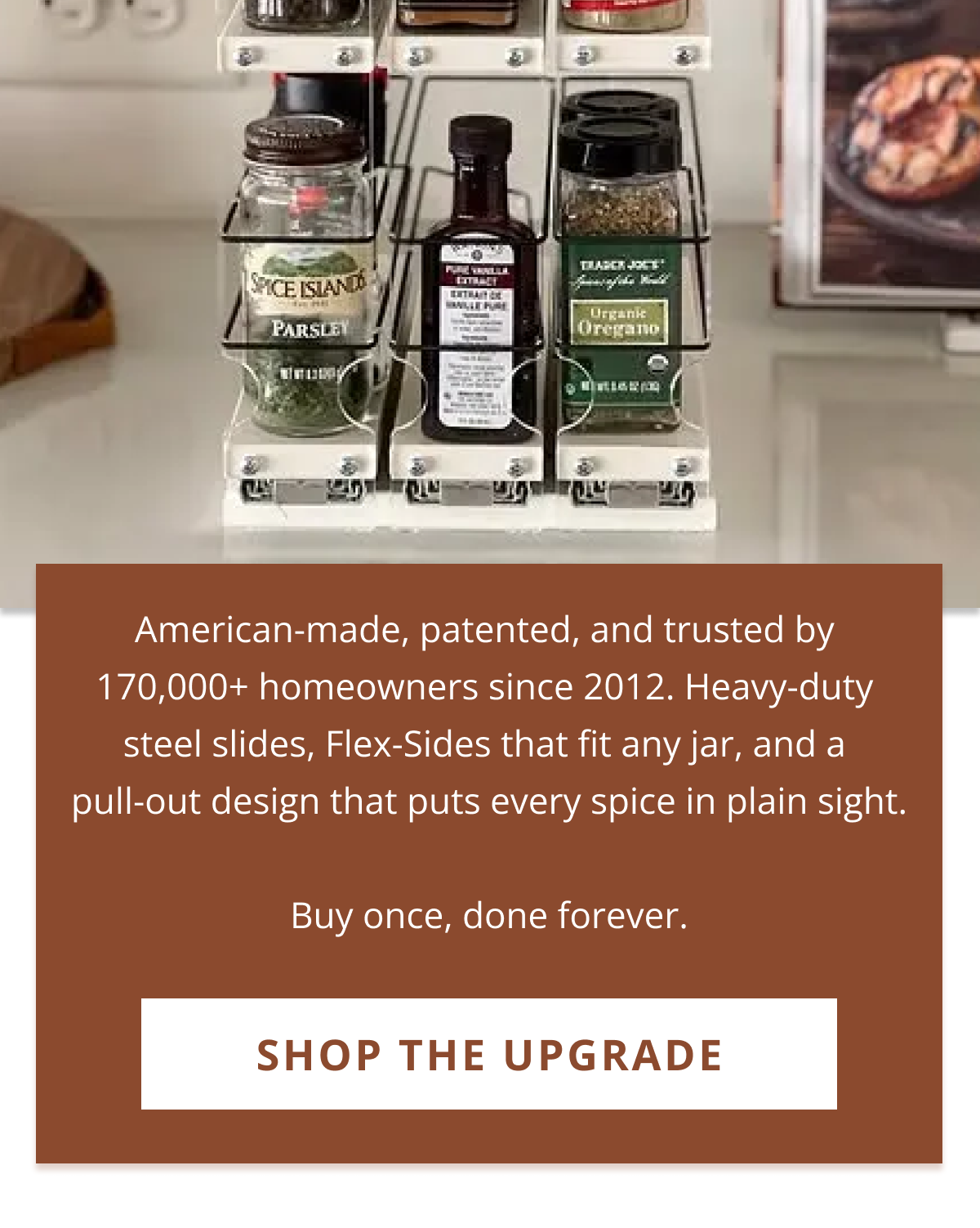 Expandable spice rack organizer holding various spice jars and bottles, displayed on kitchen counter with clean white backsplash