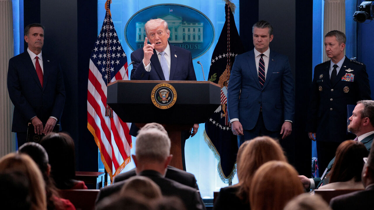 US President Donald Trump holds a press conference accompanied by US Secretary of Defense Pete Hegseth and Chairman of the Joint Chiefs of Staff Gen. Dan Caine.