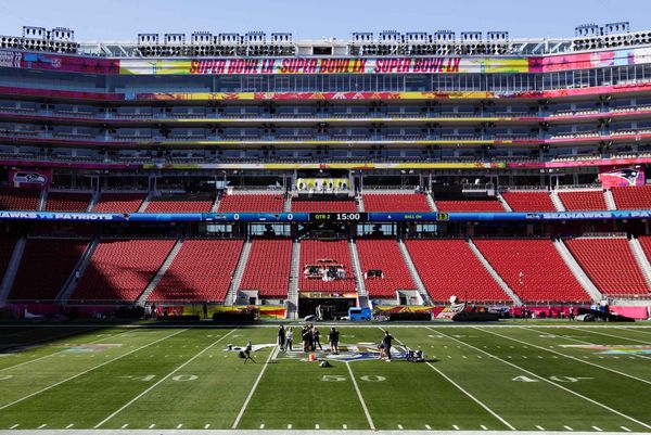 Photo: A wide shot of staff preparing to host Super Bowl LX