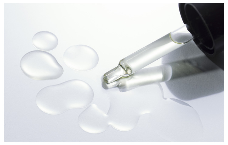 lil prick applicator with product droplets on glass