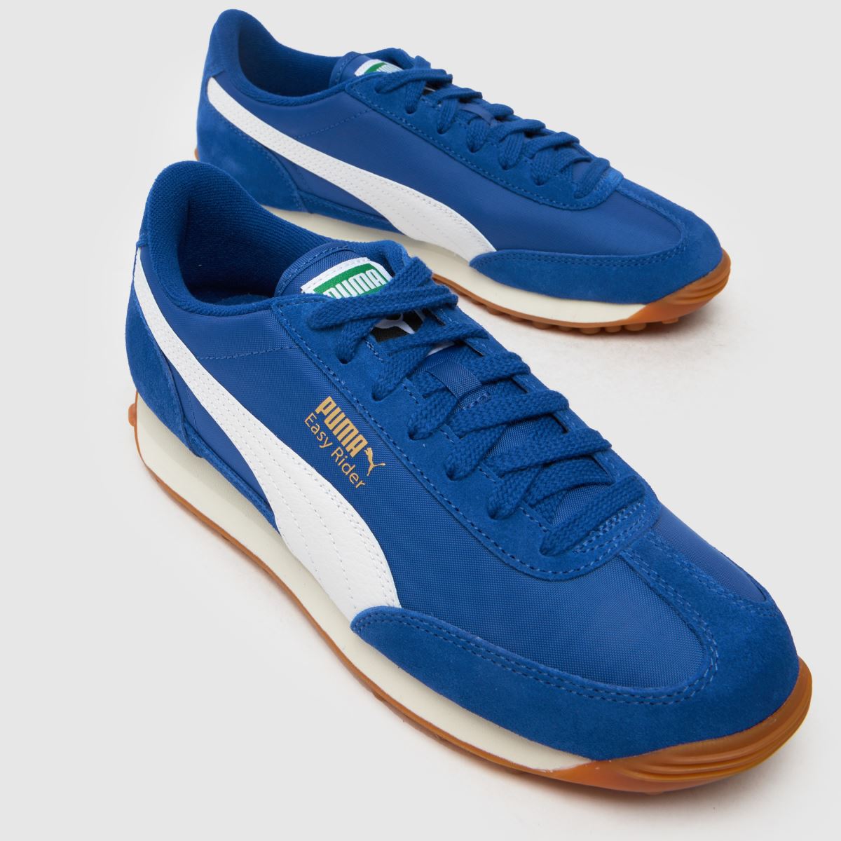 An image of blue PUMA trainers