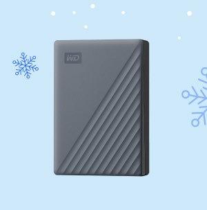 A dark grey WD My Passport external hard drive against a light blue background with white and blue snowflakes.