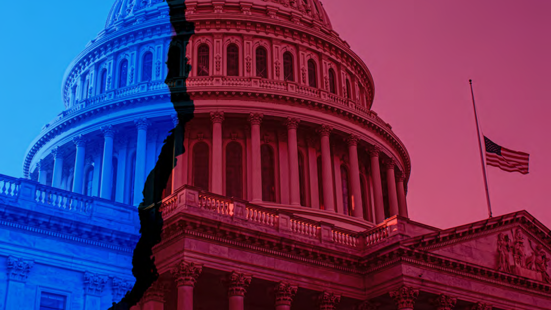 Dome of the U.S. Capitol in blue and red with the flag at half mast