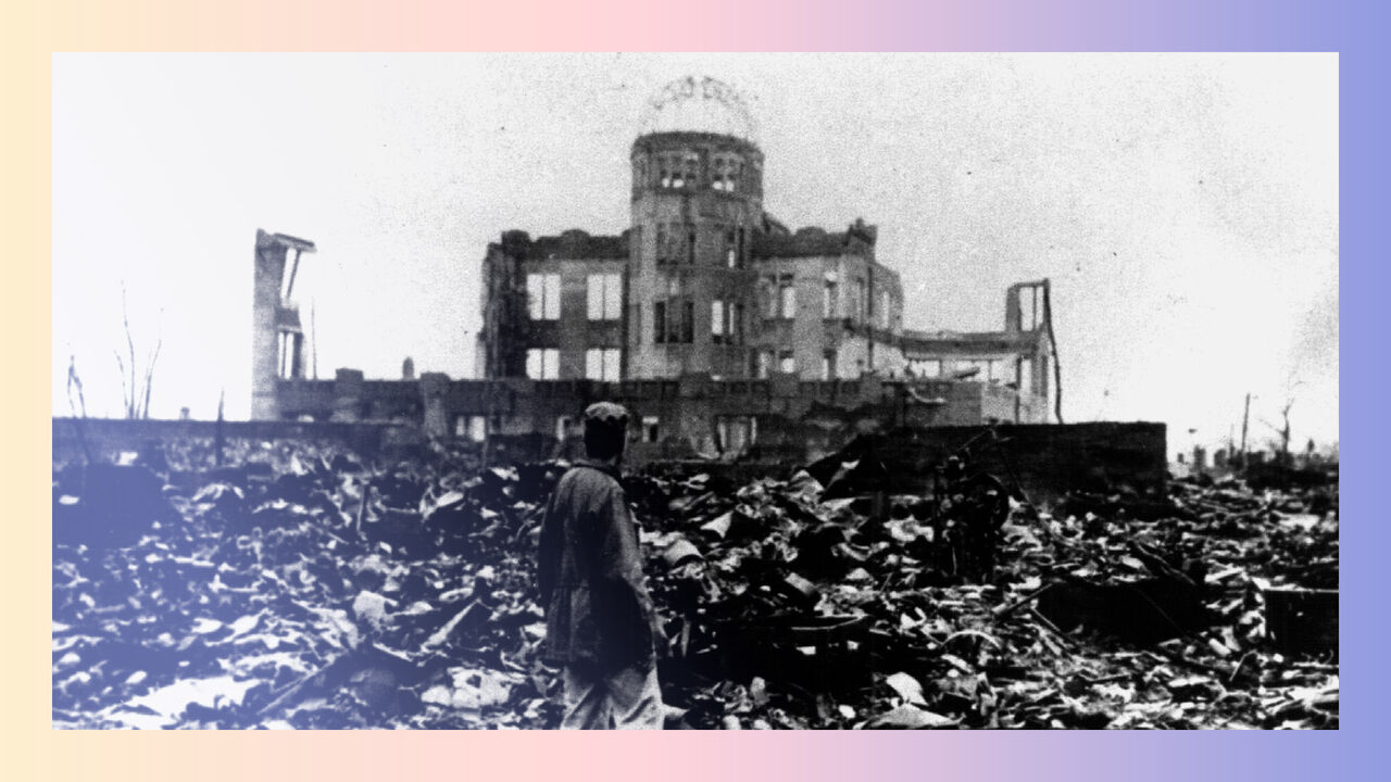 A man stands looking at The Hiroshima Peace Memorial (Genbaku Dome), it was the only structure left standing in the area where the first atomic bomb exploded on 6 August 1945.