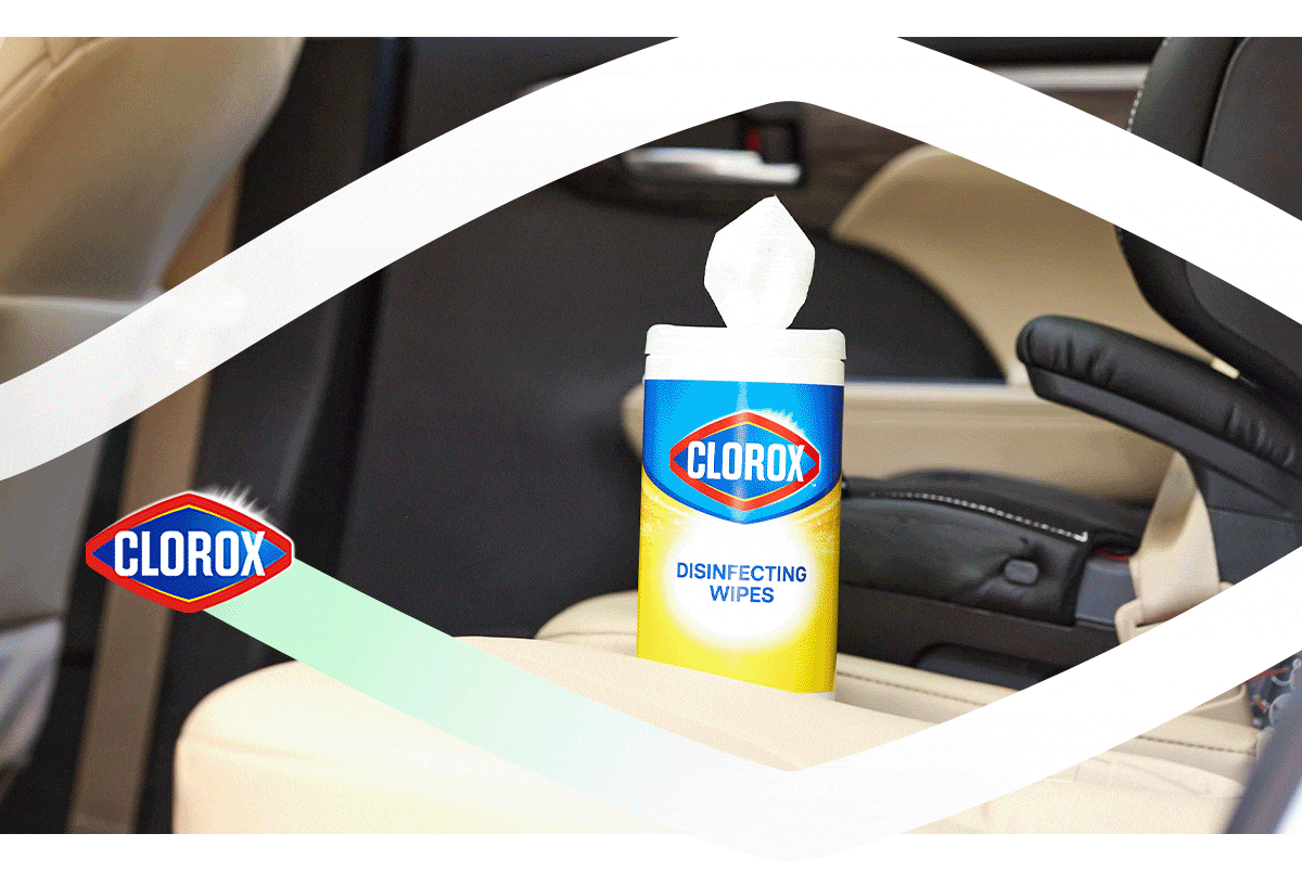 Animated GIF image where first slide shows Clorox Disinfecting wipes container in the backseat of a car next to a car seat. 2nd slide is a man wiping the car seat clean. 3rd slide is a close up of the disinfecting wipe, showing the word “HOORAY” woven into the fabric texture.