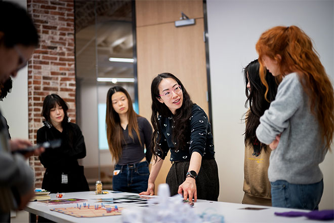 Ani Liu speaking to students.