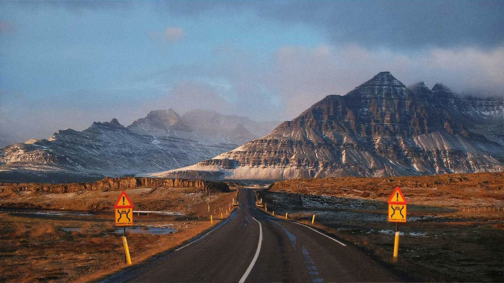 Image description: Snowy mountains from Iceland’s Ring Road.
