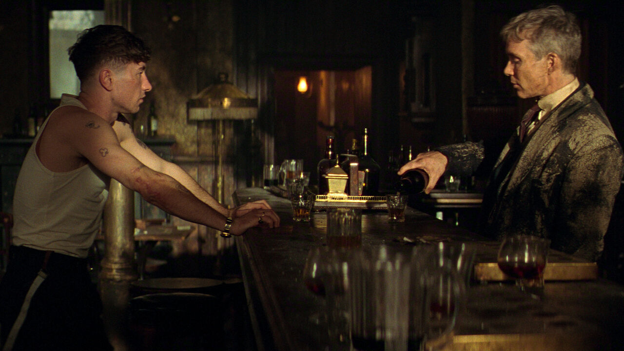 Peaky Blinders: The Immortal Man. Barry Keoghan as Duke, Cillian Murphy as Tommy in a scene at a bar.
