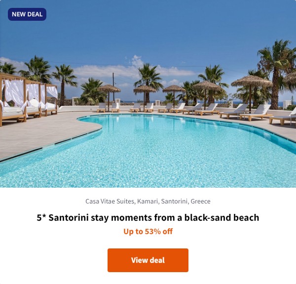 5* Santorini stay moments from a black-sand beach