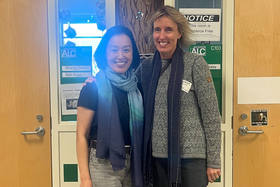 Yuko Taniguchi and Kathryn Cullen stand together smiling.