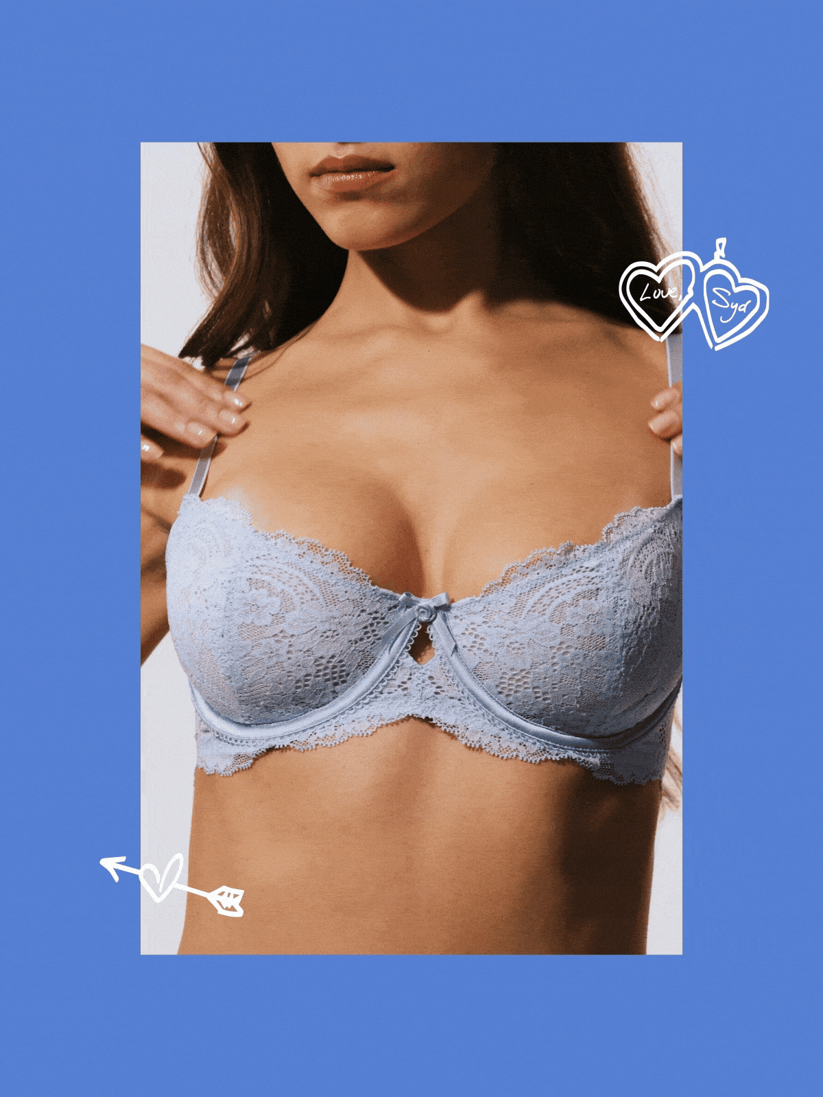 Model running her hands down a blue bra