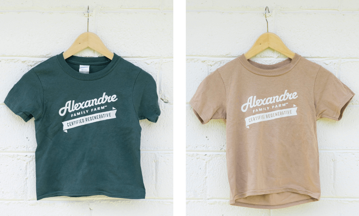 Alexandre Family Farm branded kids shirts in tan and dark green