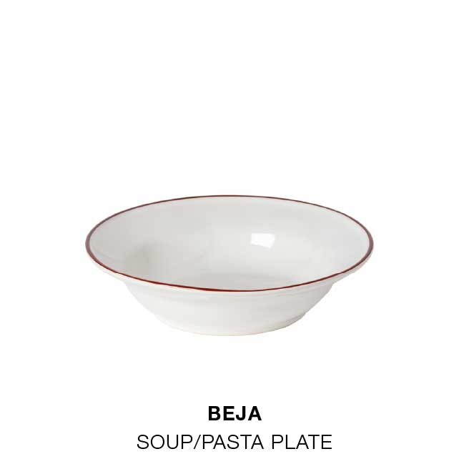 Styled for serving: Beja dinner plate in white with a red rim, Beja soup/pasta plate in white with a red rim and Gomos water glass in glass