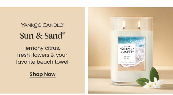 Yankee Candle Sun & Sand with description lemony citrus, fresh flowers and your favorite beach towel. Shop Now button.