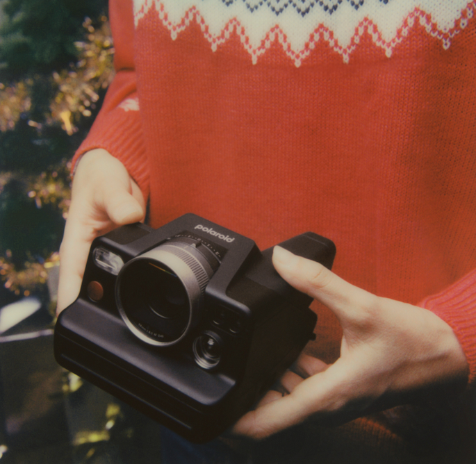 Polaroid I-2 being held