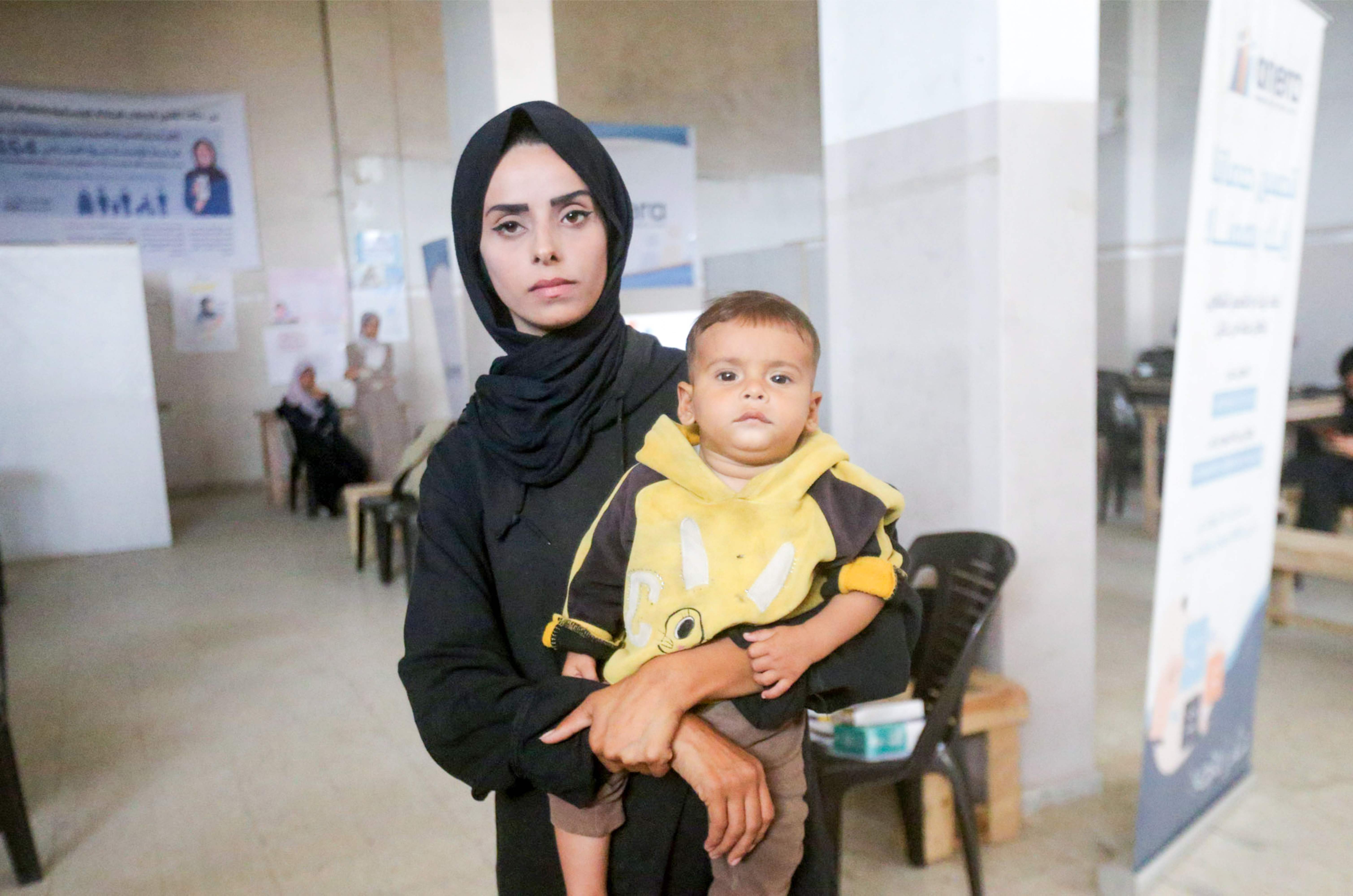 Nadia with her son at Americares-funded clinic in Gaza