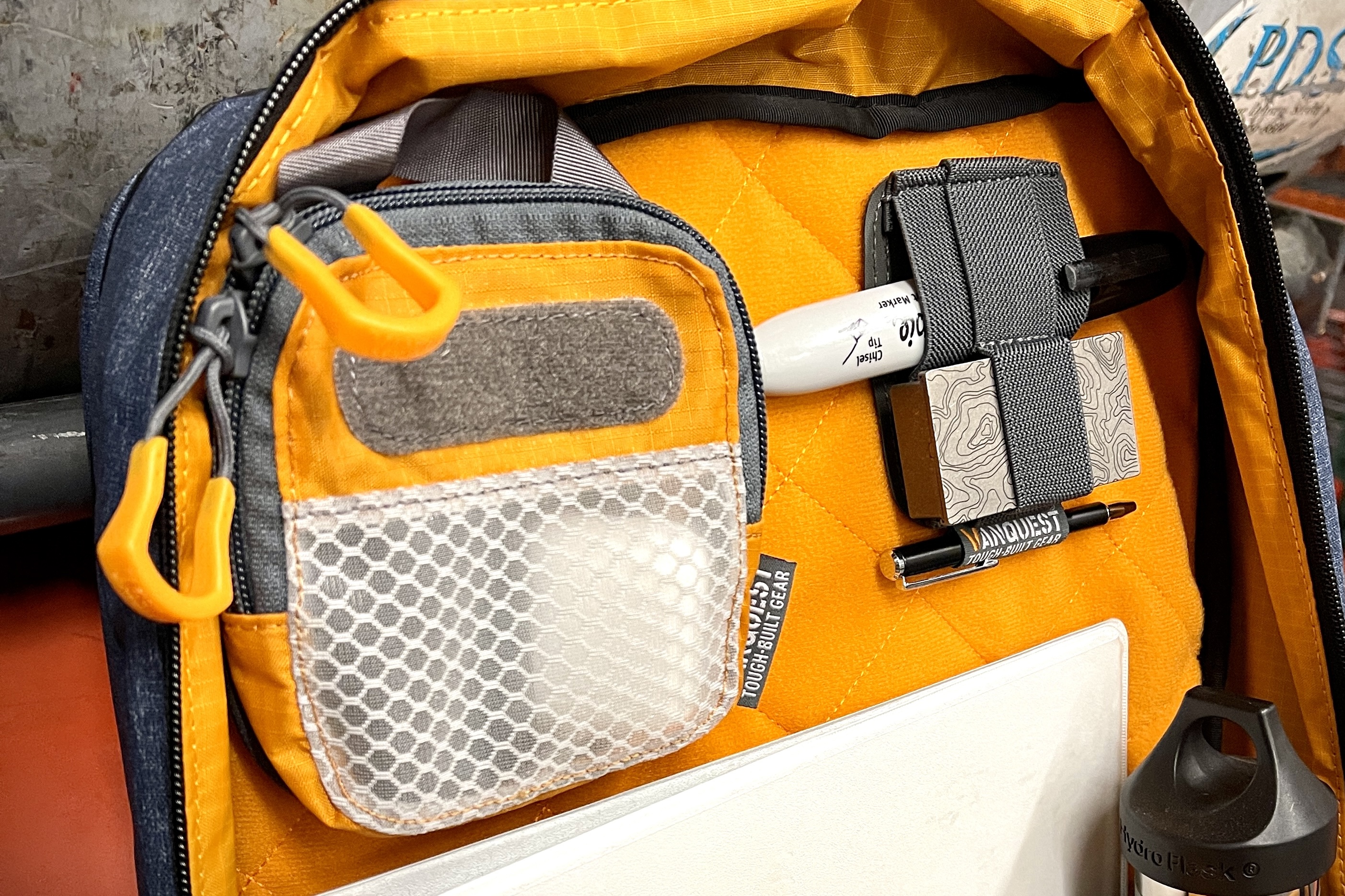 STICKY Cube XS inside ADDAX-25 backpack.