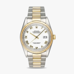 A two-toned Rolex on a light gray tile.