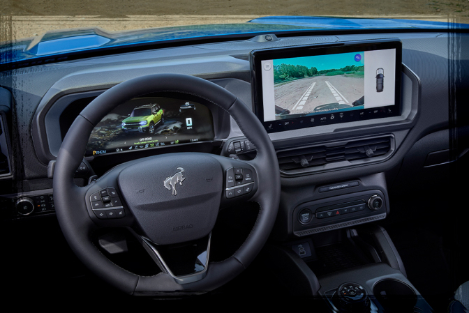 The steering wheel and touchscreen of a Ford Bronco Sport&reg; SUV