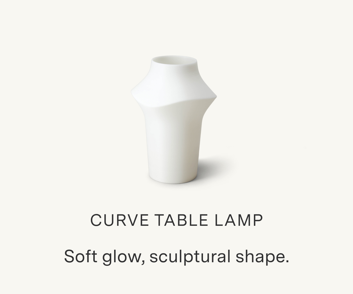 Curve Table Lamp. Soft glow, sculptural shape.
