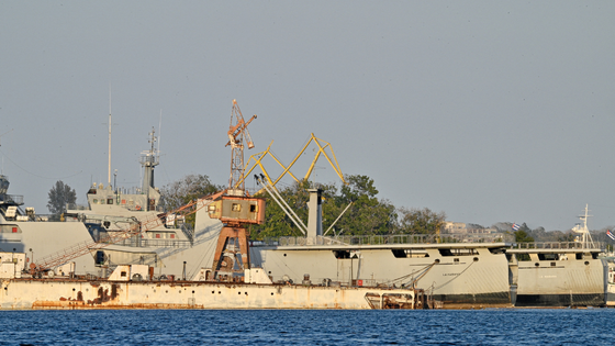 Coast Guard ships on a blue sea in a port.