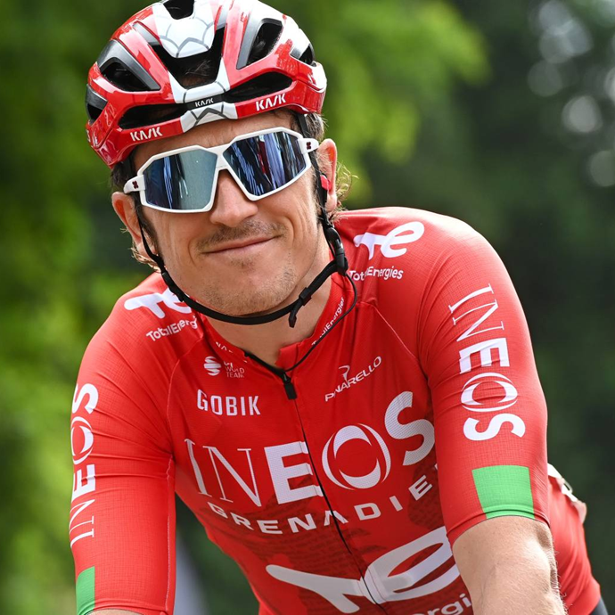 Geraint Thomas in his bespoke Lloyds Tour of Britain Men Ineos Grenadiers kit, wearing sunglasses and a helmet.