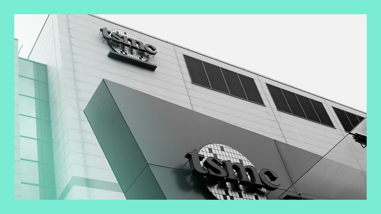 Two logos of TSMC - Taiwan Semiconductor Manufacturing Co., Ltd. Headquarters building in Hsinchu, Taiwan.