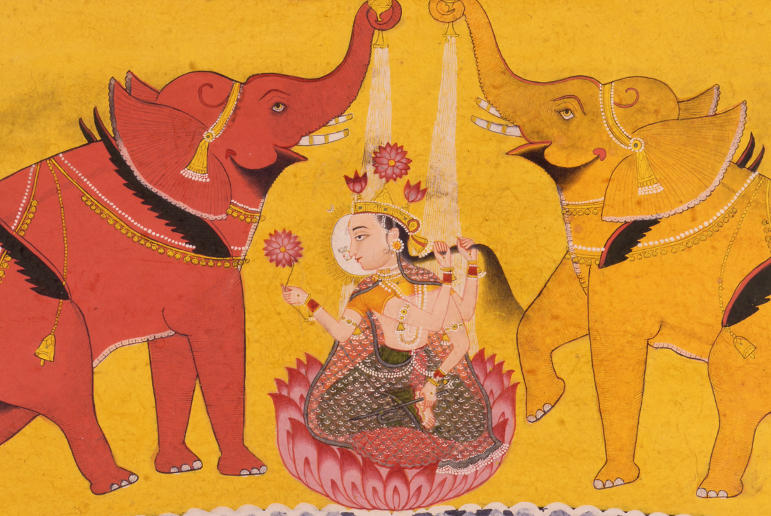 Goddess Gaja-Lakshmi sitting in a lotus flower being showered by elephants.