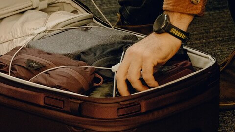 An Elite Backpack Brand’s New Suitcase Has Me Rethinking My Beef with Rolling Luggage