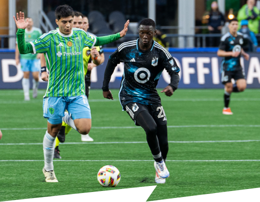 Hlongwane dribbles past Seattle defender