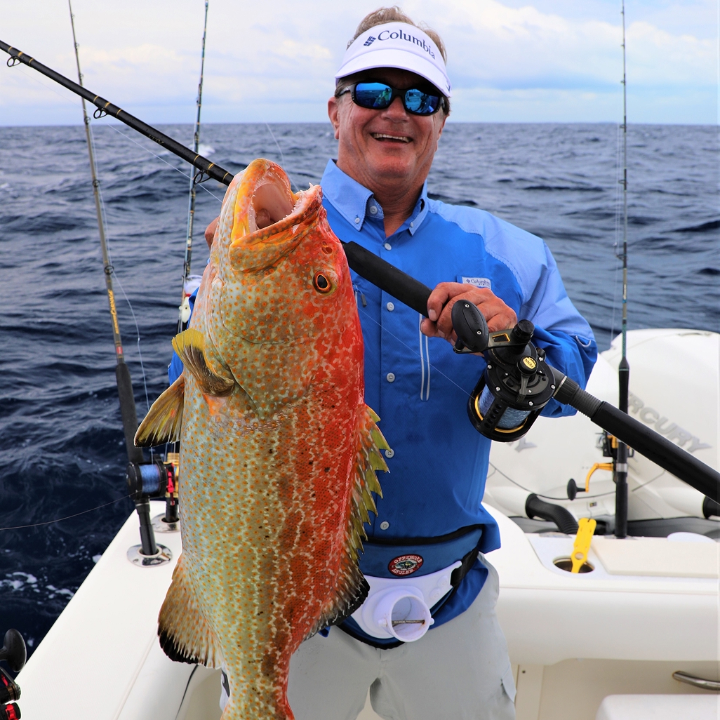George Poveromo holding a fish. 