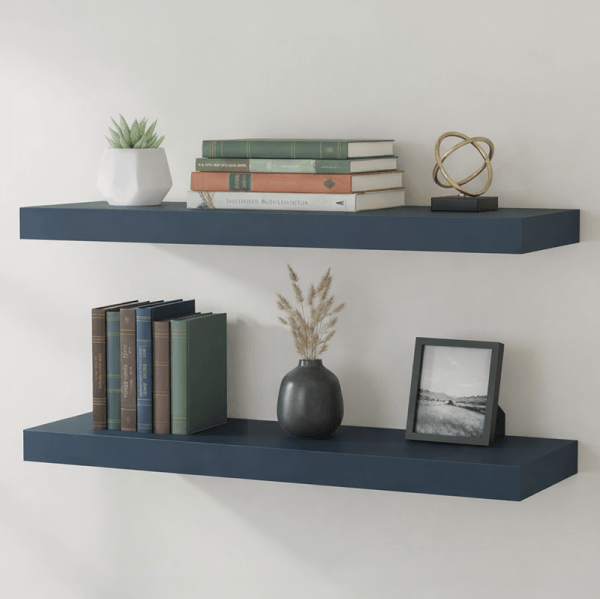 Two navy shelves with books and decor items.
